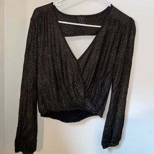 Black and gold going out top